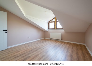 Empty Attic Room Of Modern House