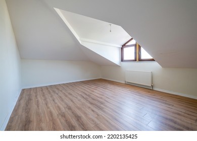 Empty Attic Room Of Modern House