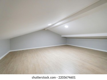 Empty Attic Room Of Modern House