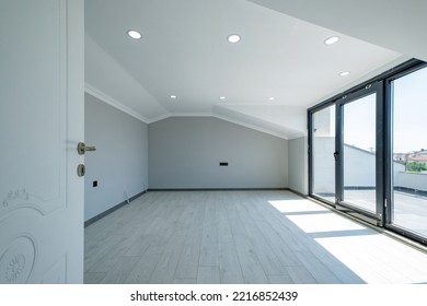 Empty Attic Room Of Modern House