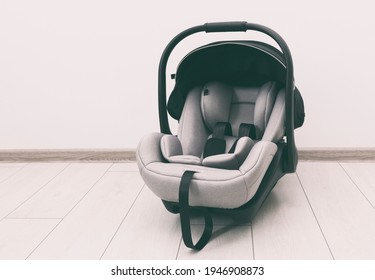 Empty Baby Car Seat On The Floor In The House