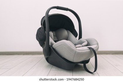 Empty Baby Car Seat On The Floor In The House