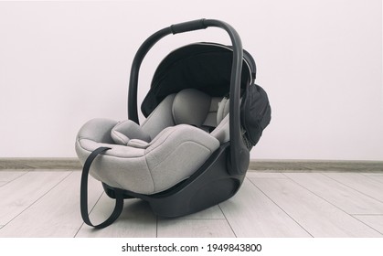 Empty Baby Car Seat On The Floor In The House