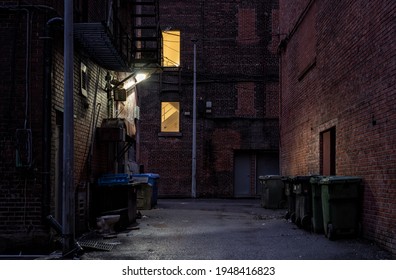 empty back alley at night  - Shutterstock ID 1948416823