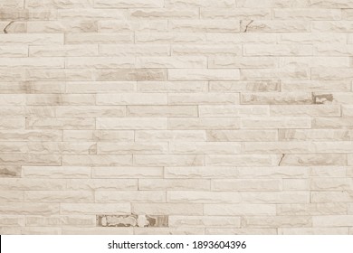 Empty background of wide cream brick wall texture. Beige old brown brick wall concrete or stone textured, wallpaper limestone abstract flooring. Grid uneven interior rock. Home decor design backdrop. - Powered by Shutterstock