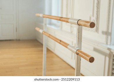 Empty ballet dance studio with barre. Professional ballet barre for stretching practicing dancing positions in dance school Dance hall ready for ballet class training. Ballet school - Powered by Shutterstock