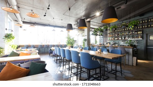 Empty bar counter interior in modern cozy cafe, panorama, copy space - Powered by Shutterstock