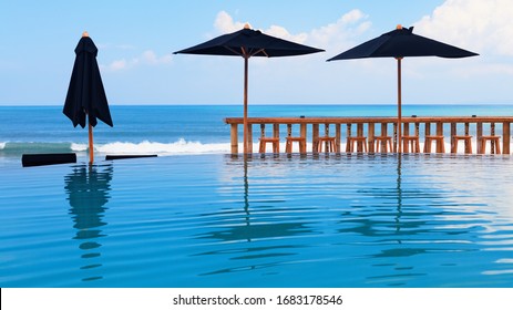 Empty Bar, Infinity Pool With No People On Tropical Beach. Coronavirus COVID- 19 Crisis In Travel. World Quarantine Impact On Tourism Industry. Hotels, Beach Clubs, Resorts Closed Due To Pandemic.