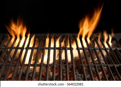 Empty Barbecue Flaming Grill Close Up With Bright Flames And Glowing Coals, Isolated On Black Background. Top View. Summer Barbecue Backyard Party Or Picnic Concept