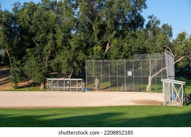 An Empty Baseball Field In The Morning