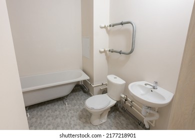 an empty bathroom in a budget social apartment without repairs. High quality photo - Shutterstock ID 2177218901