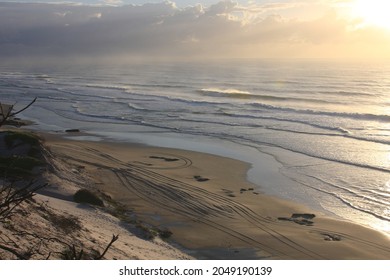 An Empty Beach With 4wd Tracks And Surf On A Northern Beach In NSW, New South Wales, Australia