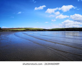Empty Beach With Rolling Waves At Low Tide Sandy Haven, Pembrokeshire, Wales