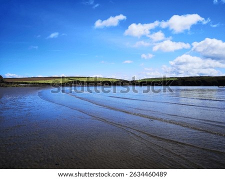 Empty Beach With Rolling Waves At Low Tide Sandy Haven, Pembrokeshire, Wales