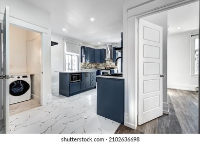 Empty Beautiful Old Style Modern Renovated Apartment In 2 Floors Canadian House With Nice Contemporary Equipped Kitchen With Appliances, Stove, Fridge, Washer And Dryer, New Bathroom And Powder Room