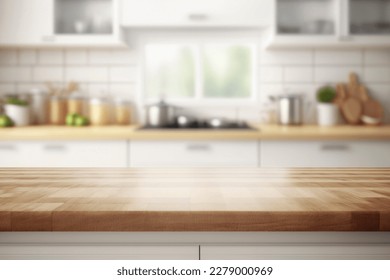 Bella mesa de madera vacía y fondo de cocina moderna y borrosa en un interior limpio y luminoso, listo para el montaje de productos