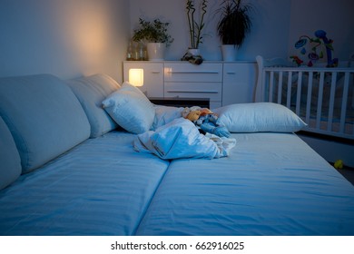 Empty Bed In Bedroom At Night