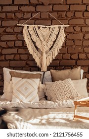 Empty Bed, Elegant Brick Wall on Background. Bedroom Modern and Cozy Interior. Soft Pillow and Blanket, Stylish Comfortable Furniture