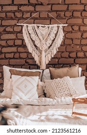 Empty Bed, Elegant Brick Wall on Background. Bedroom Modern and Cozy Interior. Soft Pillow and Blanket, Stylish Comfortable Furniture
