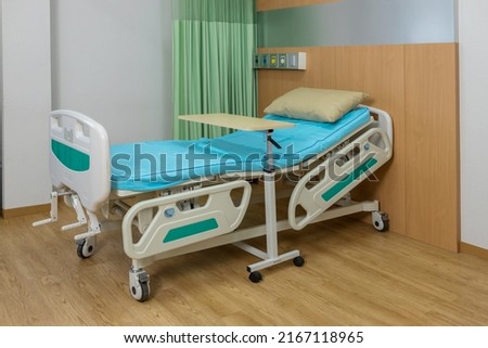 Empty bed in the modern hospital room. deluxe private ward. equipped hospital room. Medical Benefits. Reimbursement and Medical expenses.