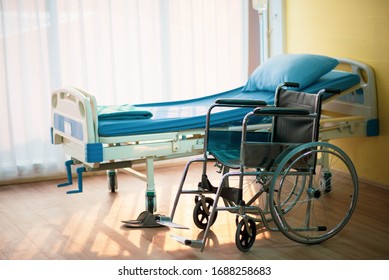 Empty Bed And Wheel Chair In Hospital Health Care Medcall