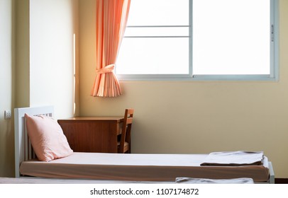 Empty Bedroom Of Student Dormitory In The University, Clean Interior Hostel