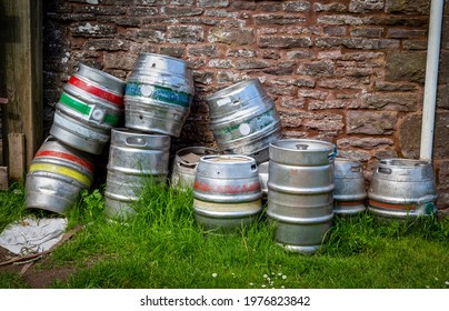 Empty Beer Barrels At The Rear Of An Old Country Pub In Wales UK
