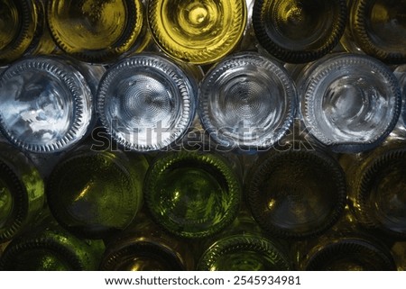 Empty beer bottles rack. Full frame. Alcohol theme.