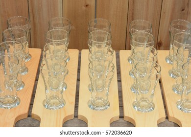 Empty Beer Flight Glasses And Paddles Prepared For Beer Tasting