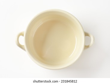 Empty Beige Bowl On White Background