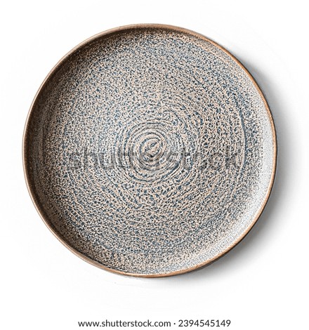 Empty beige plate isolated. on white  background. Top view, flat lay. Textured object, selective focus.