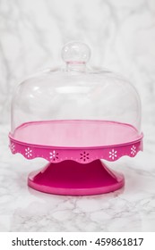 Empty Bell Jar With Pink Ground On White Marble