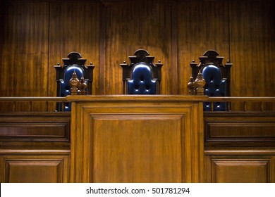 Empty Bench With Judge Chairs In Courtroom