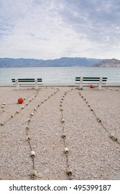 empty bench on the beach , Baska , Croatia