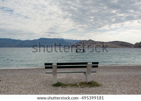 empty bench on the beach , Baska , Croatia