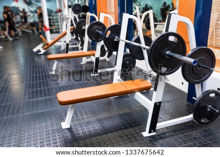 Empty bench press exercise machine in modern gym