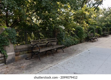 Empty Benches And Green Trees Along Morningside Park In Morningside Heights Of New York City