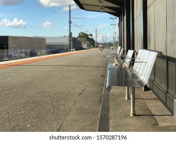 Empty Benches At Railway Station, Melbourne, VIC, Australia. Waiting For The Train To Come.