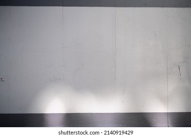 Empty Berlin Wall Graffiti Mockup. Grey Concrete Wall With Sun Light And Shadows. East Side Gallery 