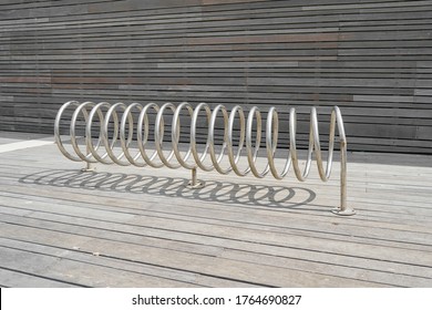 Empty Bike Parking. Parking Space Or Spot For Multiple Bikes. Place For Parking At The House Or Shop Of Bicycles Or Scooters, Environmental Transport In The City. Empty Parking In City Park.