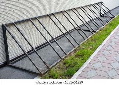 Empty Bike Parking. Parking Space Or Spot For Multiple Bikes. Place For Parking At The House Or Shop Of Bicycles. Parking In City Park.