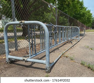 An Empty Bike Rack With Locks Still Attached.