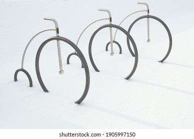 Empty Bike Rack In The Snow. Selective Focus.