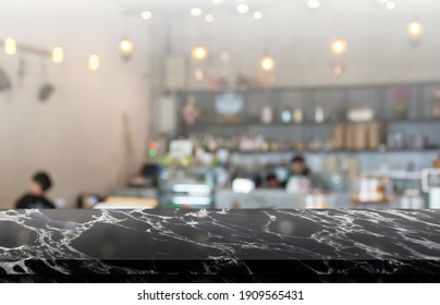 Empty black marble over blur background, for your photo montage or product display, Space for placing items on the table, product and food display.