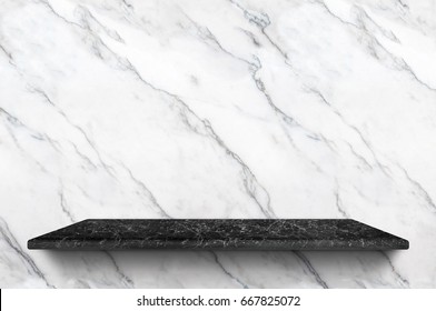 Empty black marble shelf at white marble wall background,Mock up for display or montage of product or design.