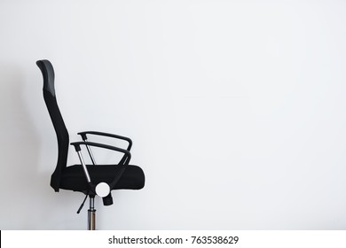 Empty Black Office Chair With White Background