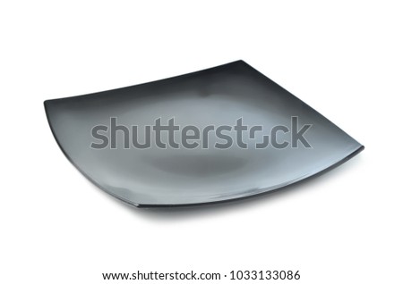 Empty black plate isolated on a white background