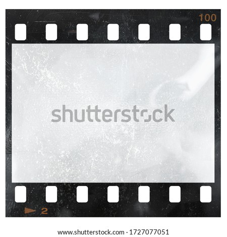 empty and blank 35mm filmstrip with dust isolated on white background and frame edge number two. 