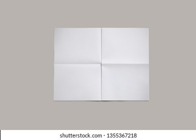 Empty Blank, White Expanded Newspaper, Mock Up, Front Page, Isolated On Grey Background.