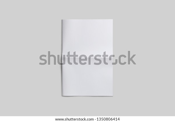 Empty, blank, white newspaper Mock up, front\
page on isolated grey\
background.